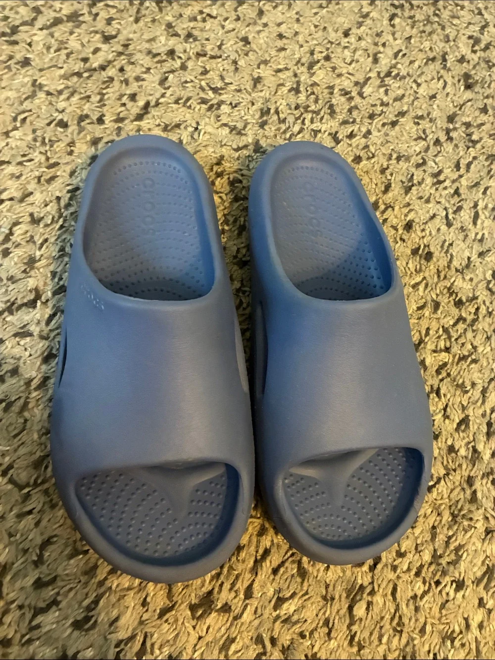 CROCS Men’s blue slides. Some scuffs on edges when look closely.